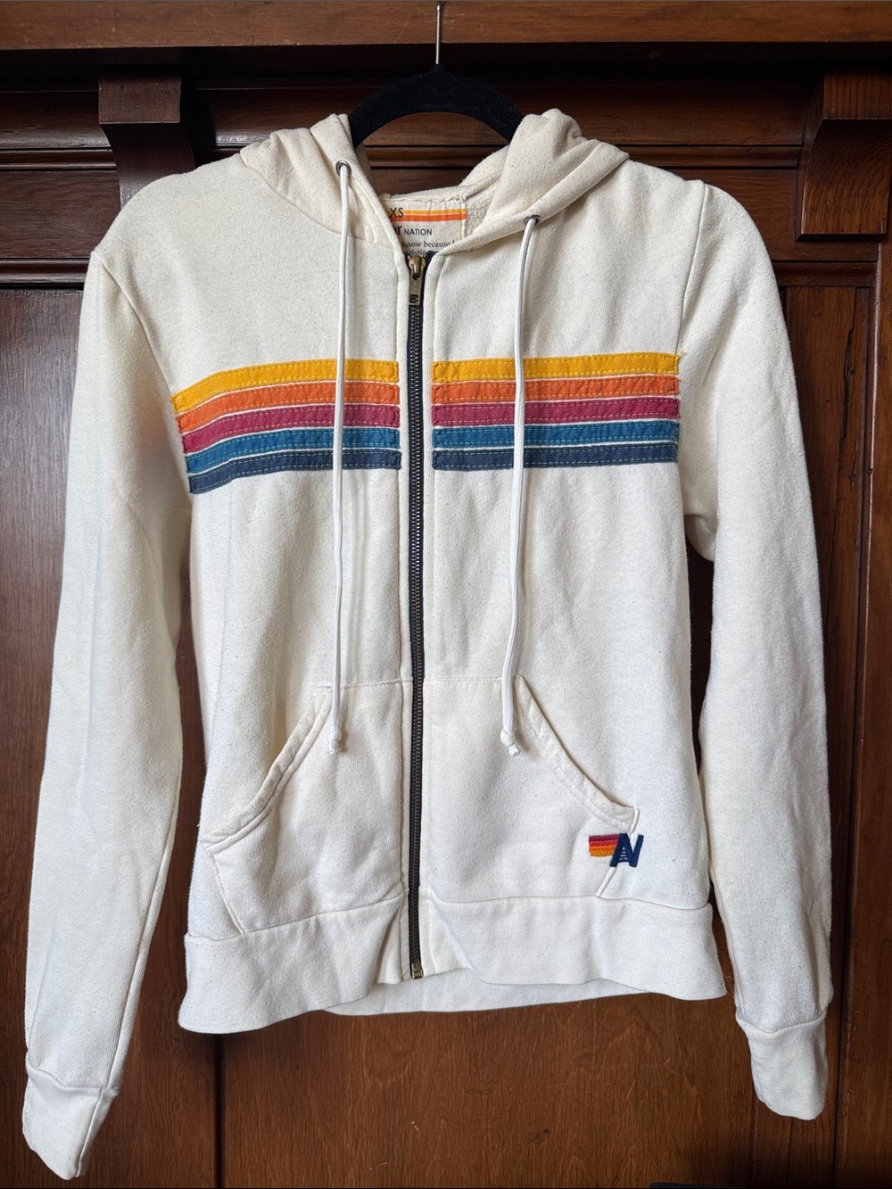 Aviator Nation Cream Hoodie with Orange and Yellow Retro Rainbow Stripes